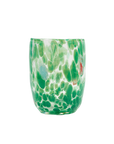 A hand-blown glass tumbler featuring a marbled pattern of vibrant green and translucent white bubbles, with a small red accent on the side, set against a plain white background.