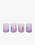 A set of four hand-blown purple Murano shot glasses with unique patterns and tiny murrina details.