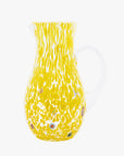 Yellow and white patterned vase on a white background