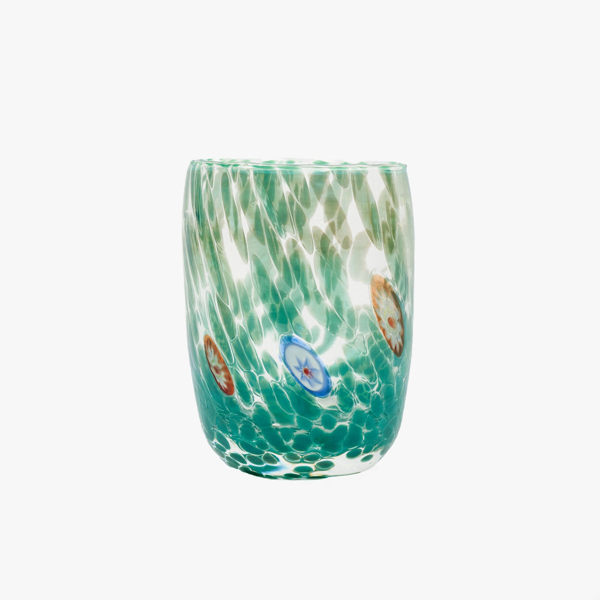 A handcrafted round Murano tumbler with a tapered silhouette, featuring green color with white patterns and multicolored details.