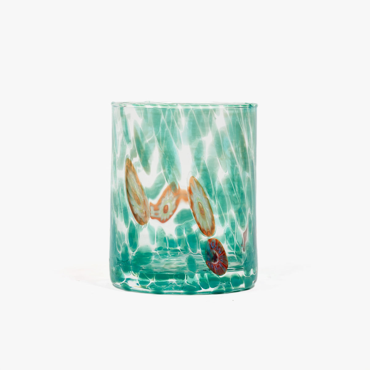 A handcrafted Straight Murano Tumbler with a geometric pattern in green and multicolored accents.