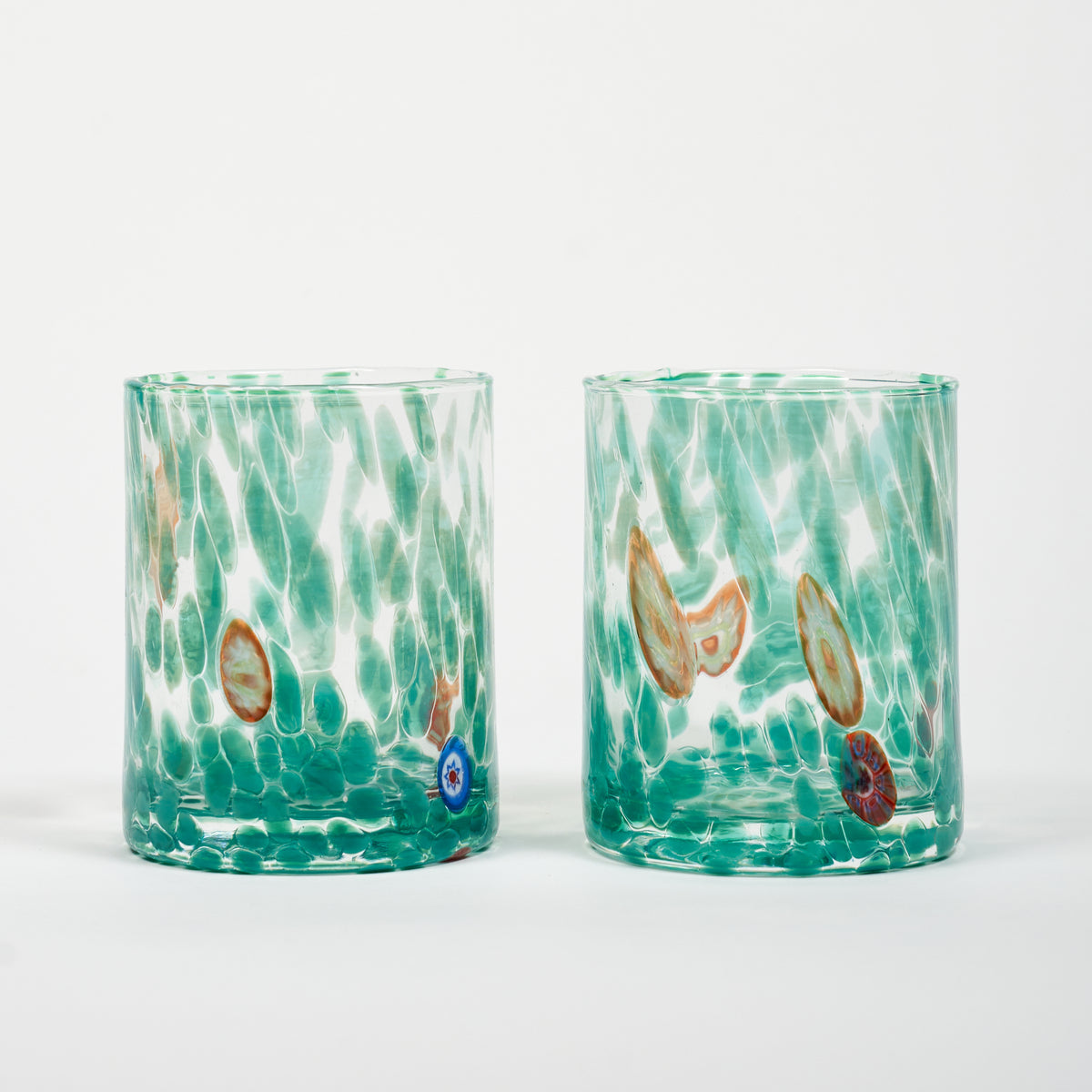 two hand-blown Murano tumblers emerald green