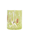 A clear glass tumbler with a vibrant lime green base, featuring organic white veining and three circular orange-red and blue-green mottled inclusions, shown against a solid white background.