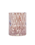 A hand-blown glass candle holder with a wavy, textured pattern in soft pink and peach tones, accented with small multicolored glass inclusions, shown on a solid white background.