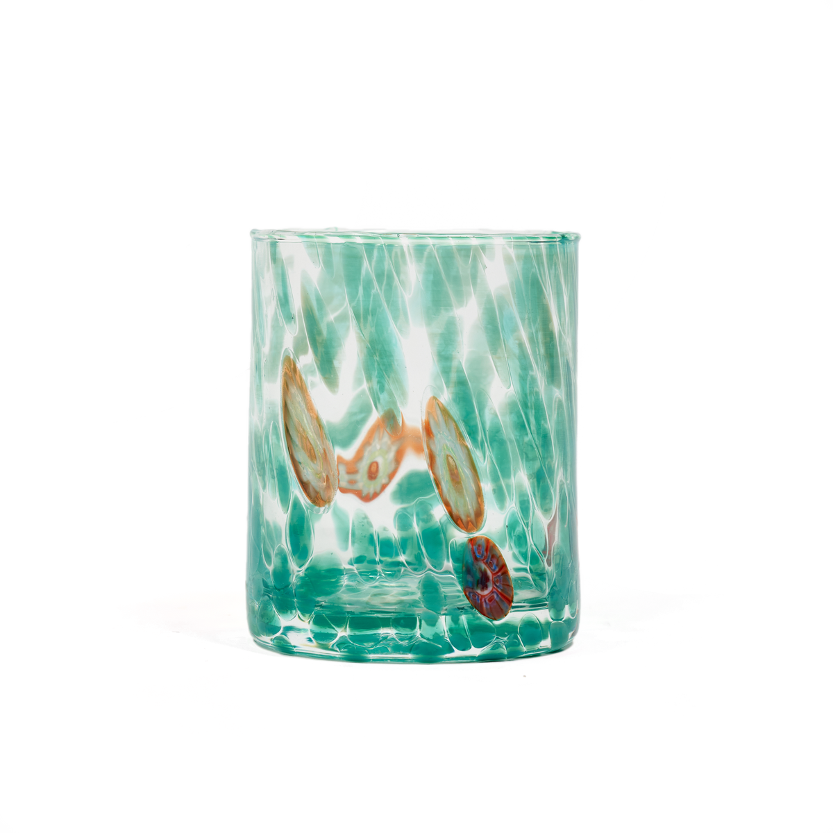 A clear glass tumbler with a vibrant turquoise and green marbled pattern, featuring embedded decorative elements including two gold-toned teardrop shapes and a small red and blue circular piece, set against a plain white background.